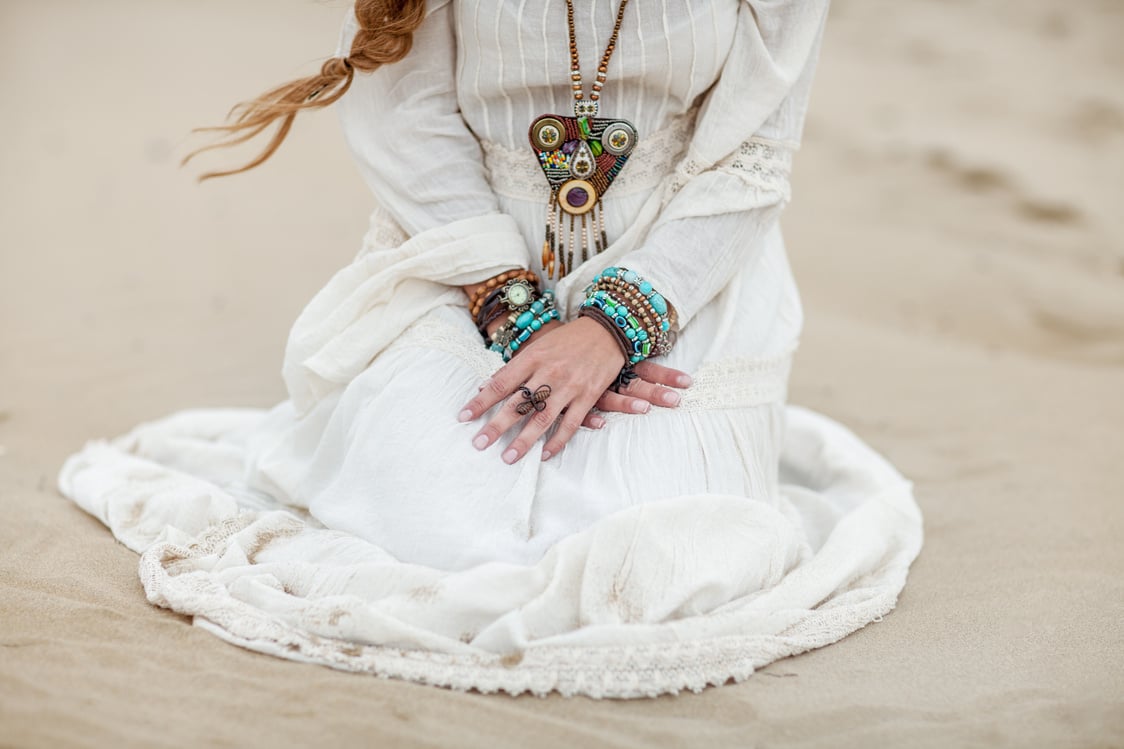 Boho woman with multicolored jewelry