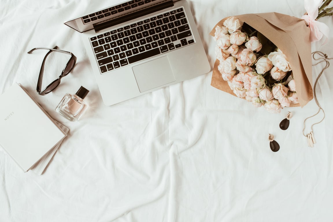 Feminine Workspace in Bed